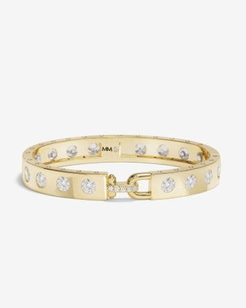 Gold bracelet with clear stone accents 