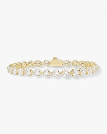 Gold bracelet with clear stones 