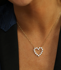 Gold necklace with a heart-shaped pendant
