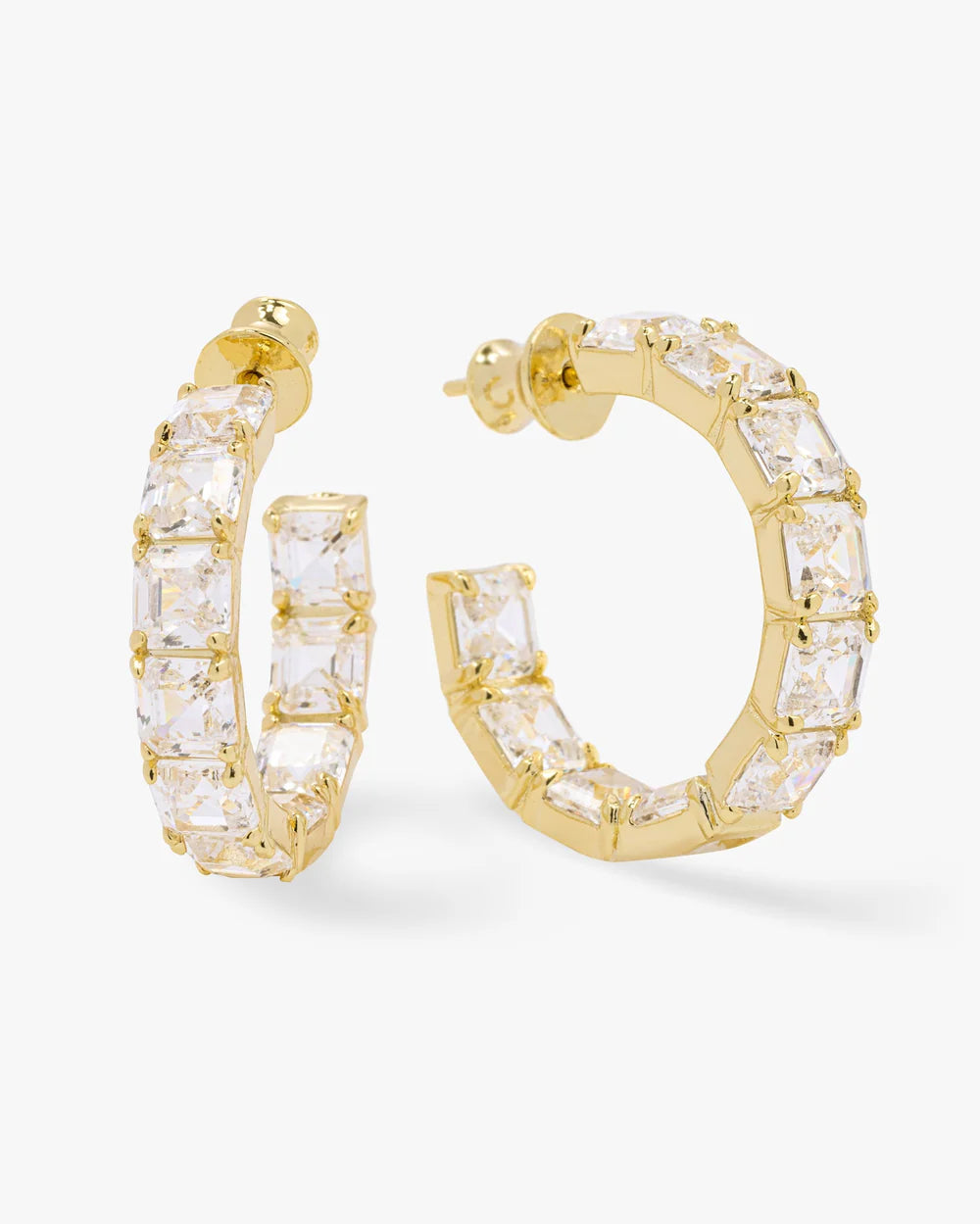Gold hoop earrings with clear gemstones