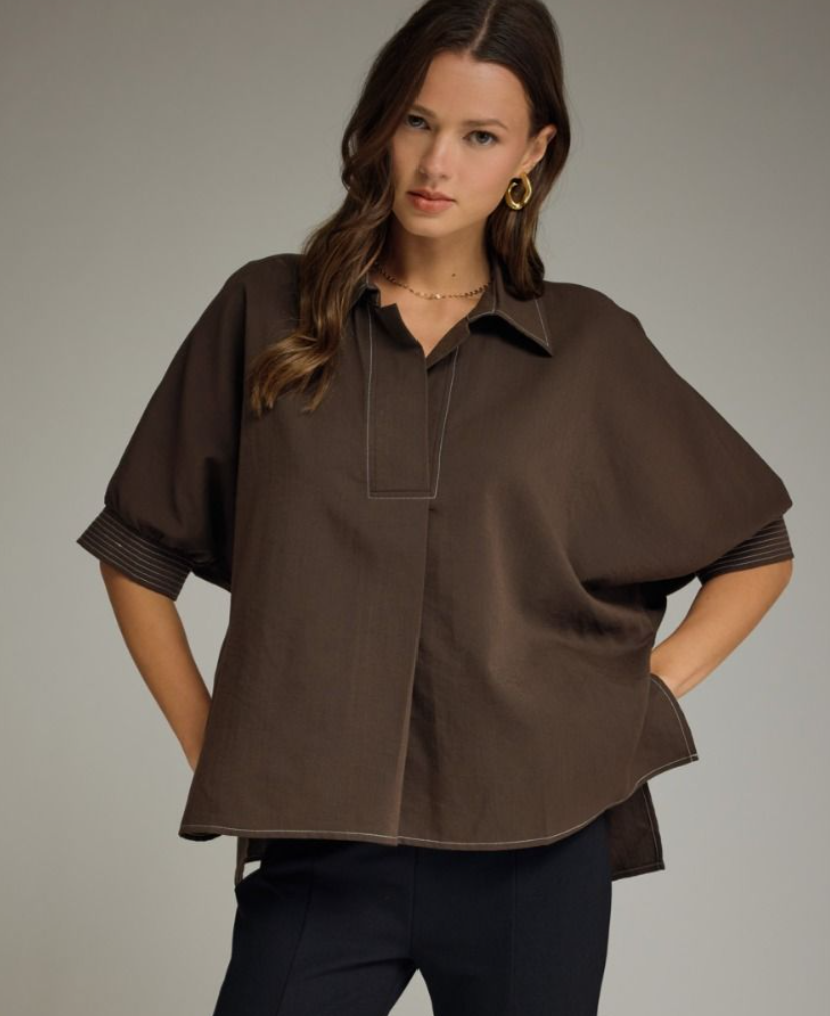 Solid short sleeve top featuring split V-neck collar